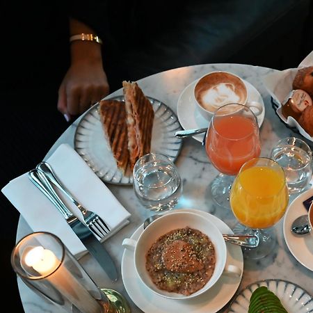 Villa Dagmar Stockholm Kültér fotó A typical breakfast at the restaurant